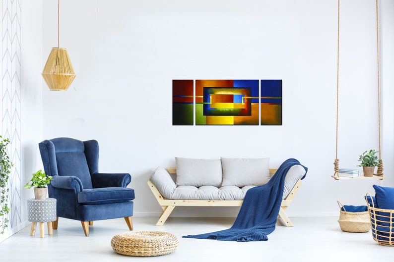 May include: Abstract art print with a multi-panel design. The print features a geometric pattern of squares and rectangles in shades of blue, green, yellow, and orange.