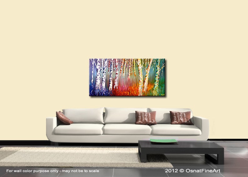 May include: Abstract painting of a forest with colorful birch trees. The trees are painted in shades of blue, green, yellow, orange, and red. The painting is on a white canvas and is framed in a black frame.