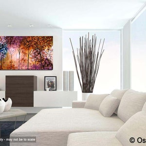 May include: Abstract painting of a forest with colorful trees in shades of pink, purple, blue, orange, and brown. The painting is displayed on a white wall in a modern living room setting.