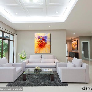 May include: A living room interior with white couches and a coffee table. A large abstract painting of a colorful flower bouquet hangs on the wall.