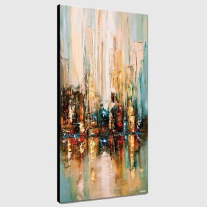 May include: Abstract painting of a city skyline with tall buildings in shades of beige, gold, and blue. The buildings are reflected in the water below, creating a sense of depth and movement. The painting is done in a loose, expressive style, with visible brushstrokes.