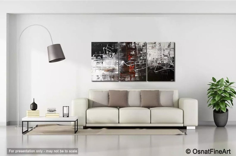 May include: Abstract triptych painting with black, white, and red hues. The painting features geometric shapes and lines, creating a modern and contemporary feel.