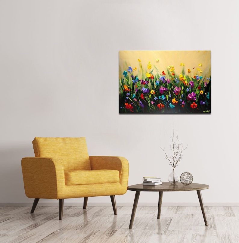 May include: A painting of a field of colorful flowers in shades of purple, blue, yellow, red, and green. The flowers are painted in a thick, textured style, giving the painting a three-dimensional effect.
