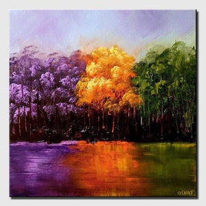 May include: A painting of a forest scene with a lake in the foreground. The trees are painted in shades of purple, yellow, and green. The lake reflects the colors of the trees.