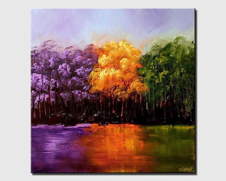 May include: A painting of a forest scene with a lake in the foreground. The trees are painted in shades of purple, yellow, and green. The lake reflects the colors of the trees.