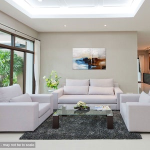 May include: A living room interior design with a white sofa, two armchairs, a glass coffee table, and a large abstract painting on the wall. The room has a gray rug, white curtains, and large windows.