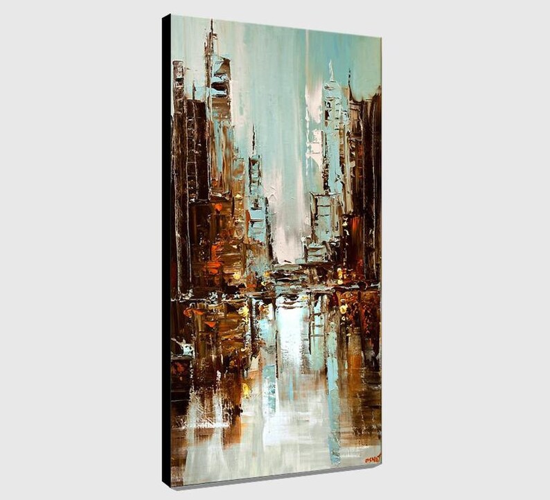 May include: Abstract painting of a city skyline with brown, blue, and white colors. The buildings are tall and narrow, and the sky is a light blue. The painting has a textured look, as if it were painted with a palette knife.