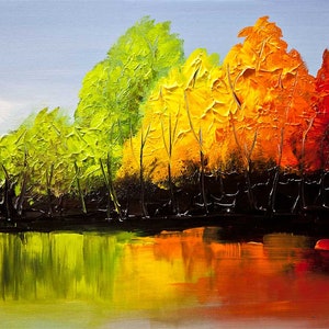 May include: A painting of a forest reflecting in a still lake. The trees are painted in shades of green, yellow, orange, and red, creating a vibrant autumn scene.
