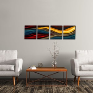 May include: A set of four abstract paintings with a modern design. The paintings are in shades of blue, red, yellow, and brown. The paintings are hung on a white wall above a coffee table and two armchairs.
