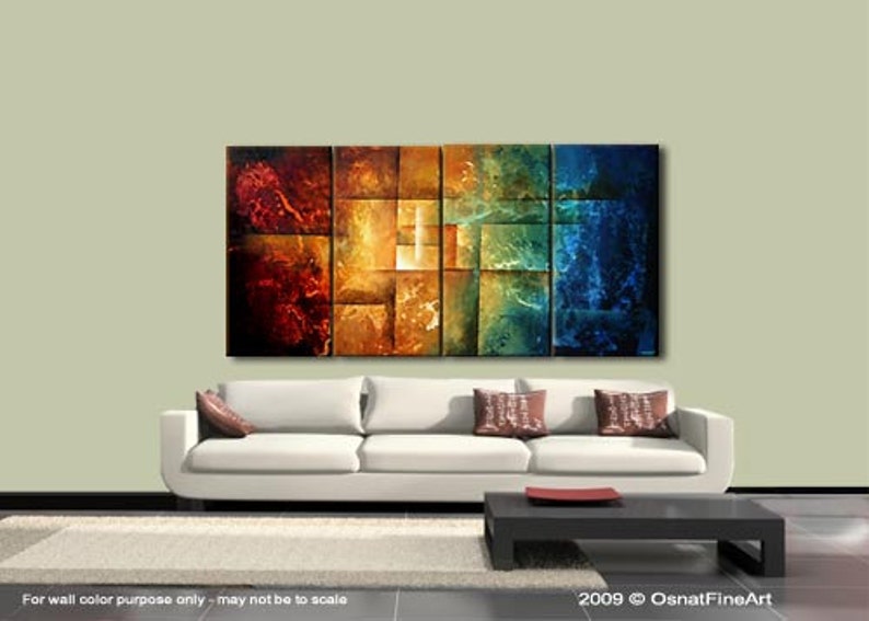 May include: Abstract painting with a geometric design in shades of red, orange, yellow, green, and blue. The painting is divided into squares and rectangles, creating a sense of depth and movement.