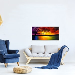 May include: A colorful painting of a sunset over a lake with a silhouetted tree in the foreground. The sky is a mix of red, orange, yellow, and purple. The lake is a deep blue with reflections of the sunset.