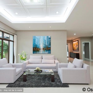 May include: A living room with white couches and a coffee table. A large abstract painting of a city skyline in shades of blue hangs on the wall.