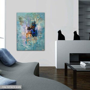 May include: Abstract painting with blue, white, and brown colors. The painting has a textured surface and is displayed on a white wall in a living room setting.