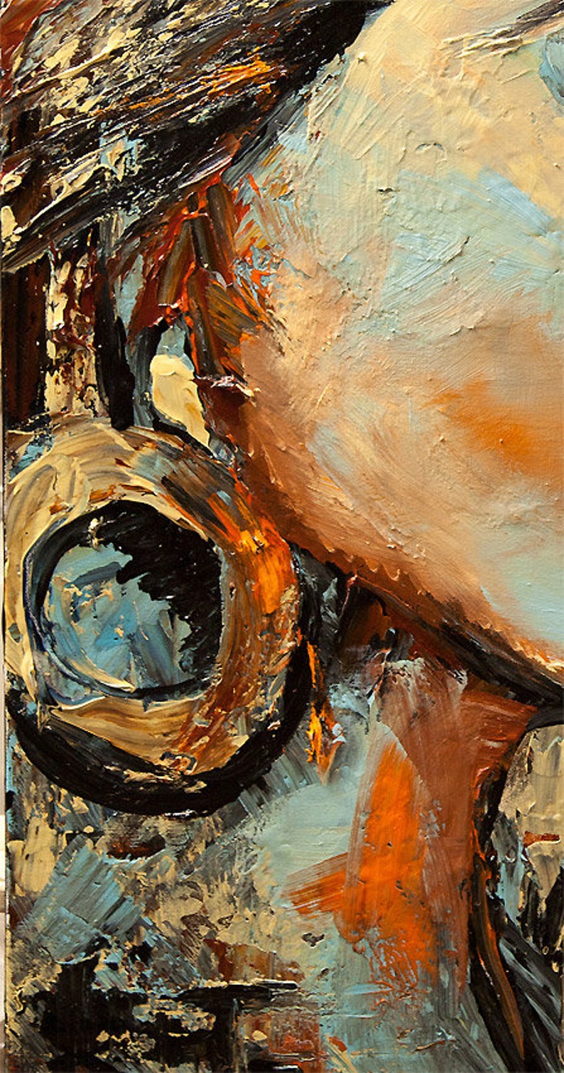 May include: Abstract painting with thick brushstrokes in shades of brown, blue, and orange. The painting features a large, circular shape in the center, resembling a wheel or a ring.