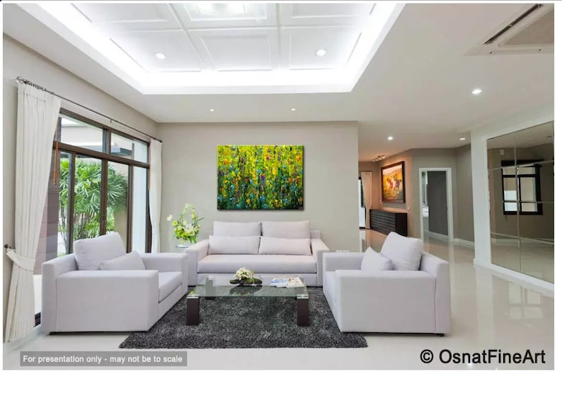 May include: A modern living room with white sofas, a glass coffee table, and a large abstract painting with green and yellow hues. The room has large windows and a neutral color palette.