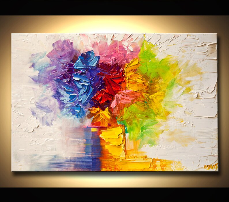 May include: Abstract painting of a colorful bouquet of flowers in a yellow vase. The flowers are painted in shades of purple, blue, red, yellow, and green. The background is white.