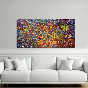 May include: Abstract painting with a colorful, textured, and dynamic composition. The painting features a variety of colors, including blue, red, yellow, green, and purple. The paint is applied in a thick, impasto style, creating a three-dimensional effect.