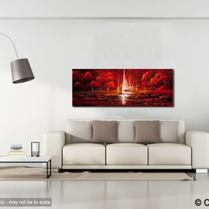 May include: A panoramic oil painting depicts sailboats on a body of water under a red sky. The artwork, with its vibrant red and white hues, is displayed above a white sofa in a modern living room setting. The painting is a landscape with a dramatic, fiery atmosphere.