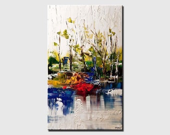 May include: Abstract painting of a landscape with trees and a river. The painting is done in a variety of colours, including blue, green, yellow, red, and white. The paint is applied in thick strokes, creating a textured effect.