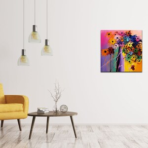 May include: Abstract painting of a colorful bouquet of flowers with pink, yellow, orange, green, blue, and purple hues. The flowers are painted in a loose, expressive style.