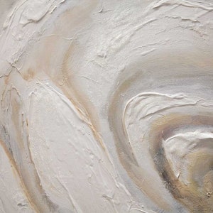 May include: Abstract painting with swirling patterns in shades of white, beige, and brown. The paint is textured and creates a three-dimensional effect.
