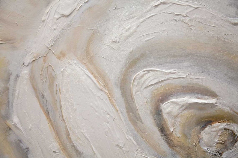 May include: Abstract painting with swirling patterns in shades of white, beige, and brown. The paint is textured and creates a three-dimensional effect.