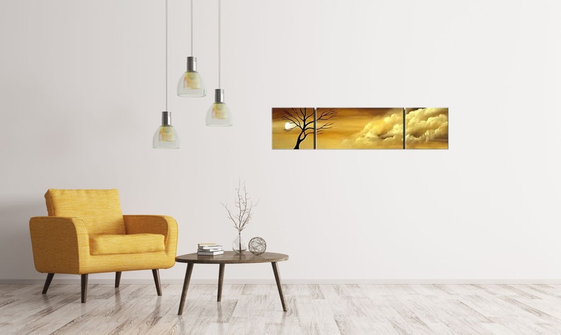 May include: A three-piece canvas wall art set featuring a silhouette of a tree with a bright yellow and orange sunset background.