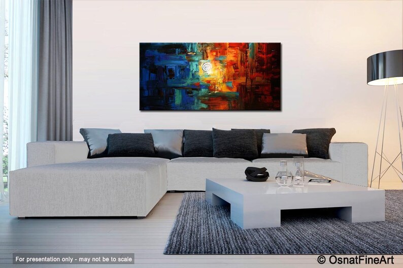 May include: Abstract painting with a mix of blue, green, orange, and red colors. The painting features a white circle in the center and a textured brushstroke style.