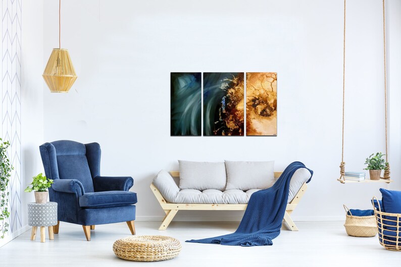 May include: A three-piece abstract art print set featuring a blue and green swirl on the left, a brown and gold swirl in the middle, and a brown and gold swirl on the right.