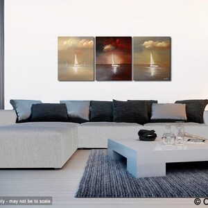 May include: A set of three abstract paintings depicting sailboats on a body of water with a cloudy sky. The paintings are in shades of brown, red, and beige.