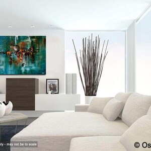 May include: Abstract painting with teal, brown, and white colors. The painting is hanging on a white wall in a modern living room with a white couch and a vase of brown branches.