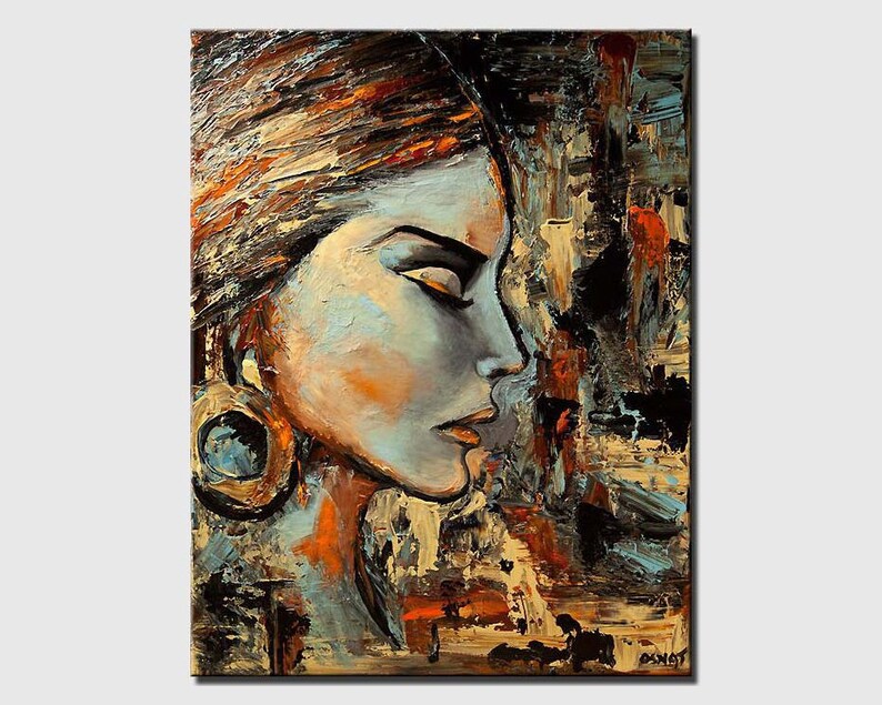 May include: Abstract painting of a woman's face in profile, with a large earring. The painting is done in a palette of blues, browns, and yellows, with a textured brushstroke.