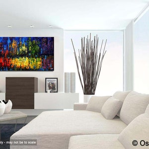 May include: Abstract painting of a cityscape in vibrant colors, including red, yellow, blue, and green. The painting is displayed on a white wall in a modern living room setting.