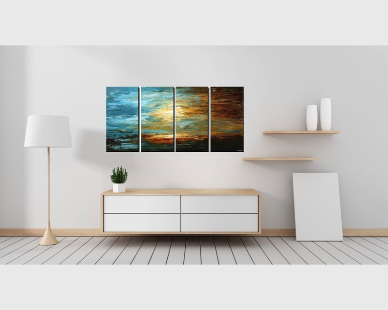 May include: A four-piece abstract painting set with a blue, green, and brown color scheme. The painting depicts a sunset over a body of water.