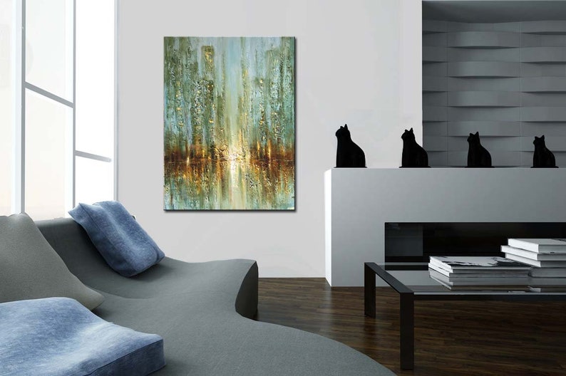 May include: Abstract painting of a city skyline with a reflection of the buildings in the water. The painting is in shades of blue, green, and gold.