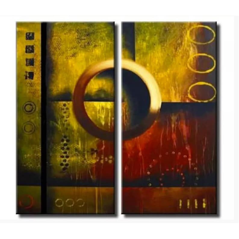 May include: Abstract painting with two panels, featuring a large, dark circle with a gold outline, set against a background of yellow, brown, and red. The painting has a textured, layered look.