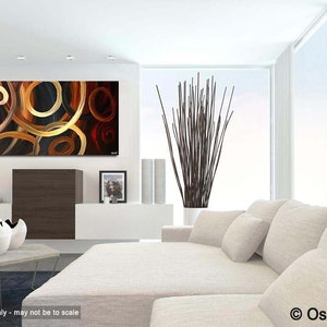 May include: Abstract painting with a modern design featuring overlapping circles in shades of gold, brown, red, and blue. The painting is displayed in a contemporary living room setting.