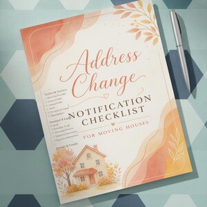 May include: A printed Address Change Notification Checklist for moving houses, featuring a watercolour-style illustration of a house and trees, with sections for Utilities, Services, Financial, Legal, and Friends and Family, accompanied by a silver pen.