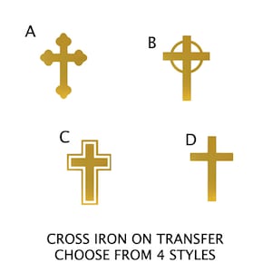 May include: Four different styles of iron-on transfer crosses. The crosses are gold and have different designs. The letters A, B, C, and D are next to each cross. The text below the crosses reads "CROSS IRON ON TRANSFER CHOOSE FROM 4 STYLES".