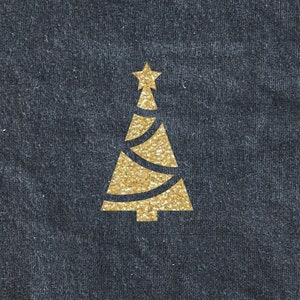 May include: A gold glitter Christmas tree design on a dark blue denim fabric.