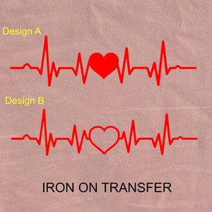 May include: Two designs for an iron-on transfer featuring a red heart inside a red heartbeat line. Design A has a solid heart, while Design B has an outline heart. The text "IRON ON TRANSFER" is printed below the designs.
