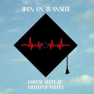 May include: Iron-on transfer design of a graduation cap with a red heartbeat graphic.  Choose from 30 different colors.  "IRON ON TRANSFER"