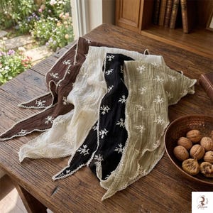 Lightweight bohemian hair scarf displayed on wooden background