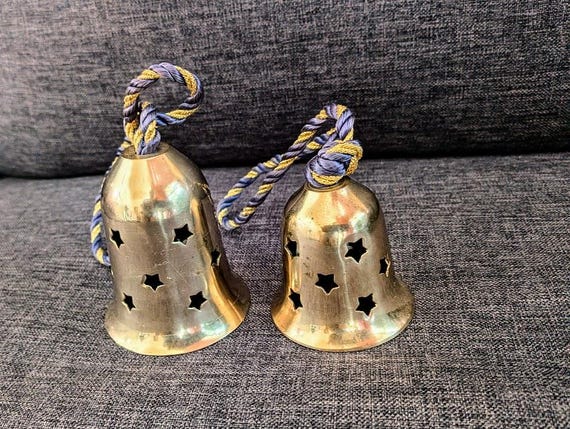 Set Brass** Bells - Ringing Bells with Star Cut Outs - Braided Hang Cords