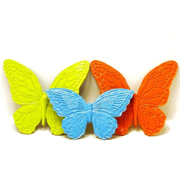 colorful butterfly wall hangings // upcycled, bright housewares, turquoise, lime green, neon, orange, butterflies, funky, 70s, kids decor