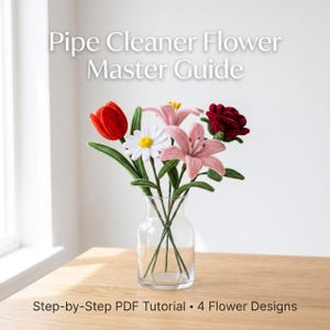 May include: A clear glass vase displays a collection of handmade pipe cleaner flowers. The bouquet features a red tulip, a white daisy, pink lilies, and a red rose. The text "Pipe Cleaner Flower Master Guide" is at the top.