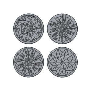 May include: A set of four circular coasters in a light gray color, each featuring a unique geometric pattern composed of intersecting lines and triangles. The designs are etched into the flat, round surfaces, creating a structured, symmetrical appearance across all four individual pieces.