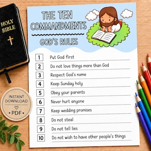 May include: A printed sheet titled The Ten Commandments God's Rules featuring a cartoon illustration of a figure reading a book on a green cloud. The list includes ten numbered points. A black Holy Bible and colored pencils are placed nearby.