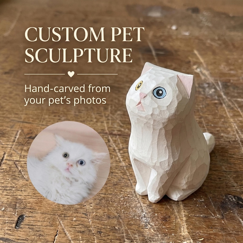 May include: A hand-carved wooden cat sculpture with a textured finish, featuring one yellow eye and one blue eye. The text CUSTOM PET SCULPTURE and Hand-carved from your pet's photos is visible, along with a circular photo of a white cat.