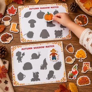 Puede incluir: Dos hojas de actividades rectangulares blancas tituladas AUTUMN SHADOW MATCH con recortes coloridos de temática otoñal que incluyen una calabaza, un erizo, un caracol, un búho y un espantapájaros. Siluetas grises oscuras.